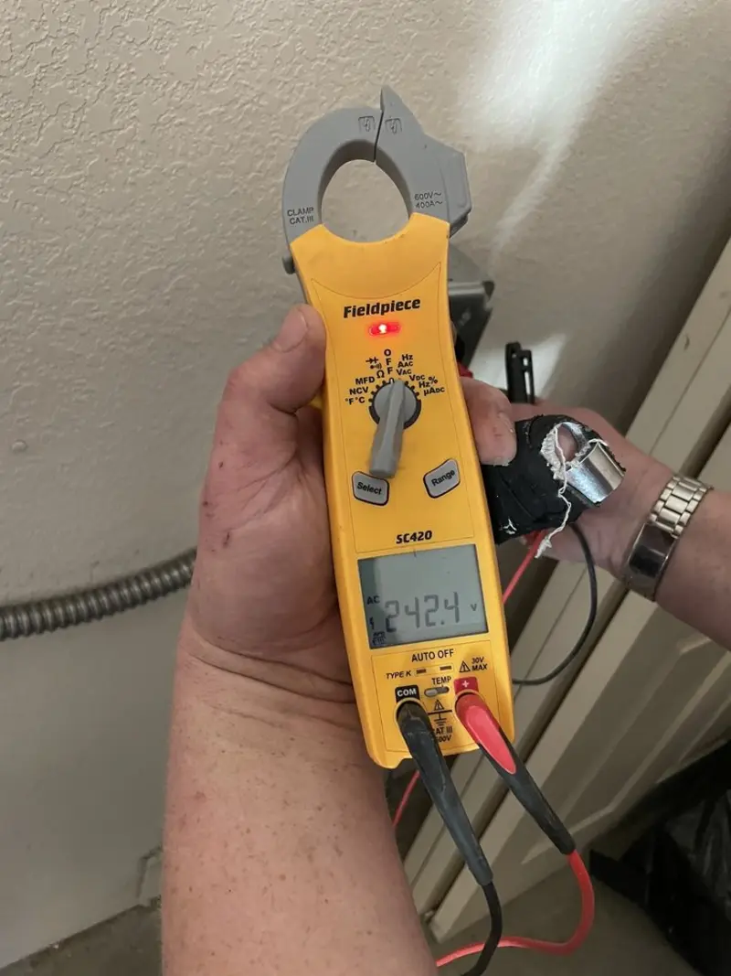 Voltage testing with clamp meter during Generator Installation in Madeira Beach